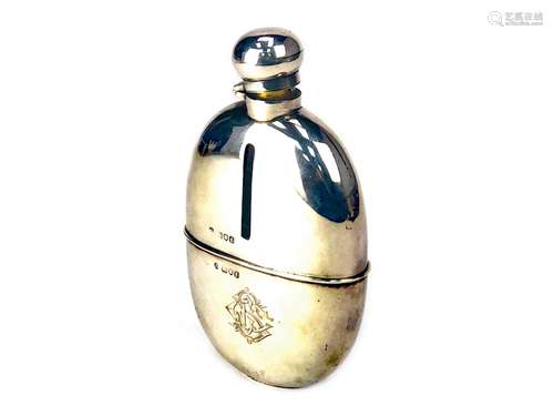 AN EARLY 20TH CENTURY SILVER MOUNTED HIP FLASK