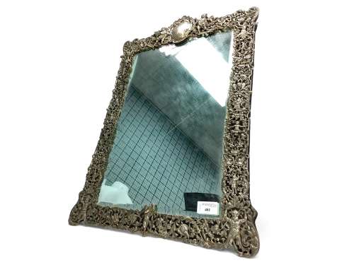 A SILVER FRAMED TABLE MIRROR