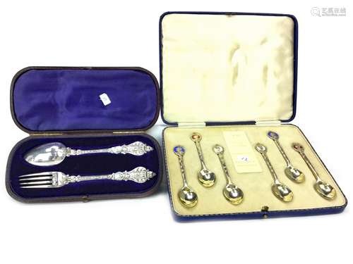 A CHRISTENING FORK AND SPOON SET AND A SET OF SIX SILVER GILT SPOONS