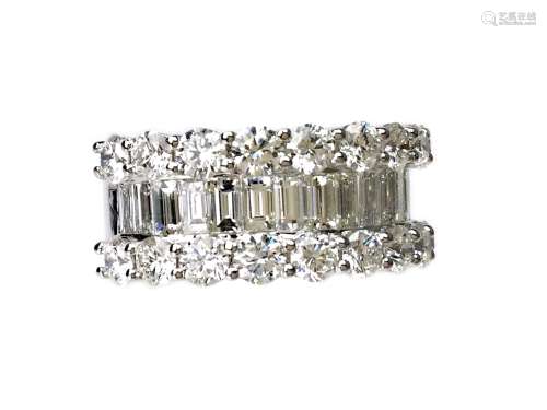 DIAMOND HALF ETERNITY RING, set with emerald cut diamonds within a raised border of round