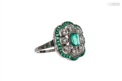 EMERALD AND DIAMOND RING, the central step cut emerald surrounded by diamonds totalling