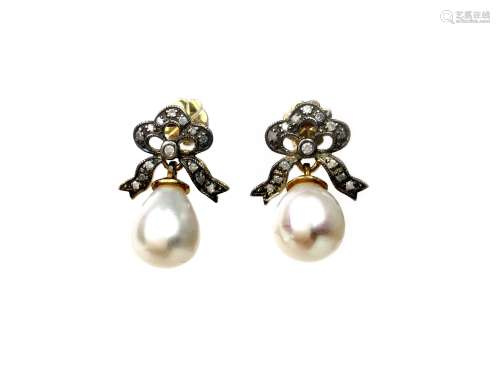PAIR OF PEARL AND DIAMOND EARRINGS, each set with a teardrop shaped pearl beneath a diamond set bow,