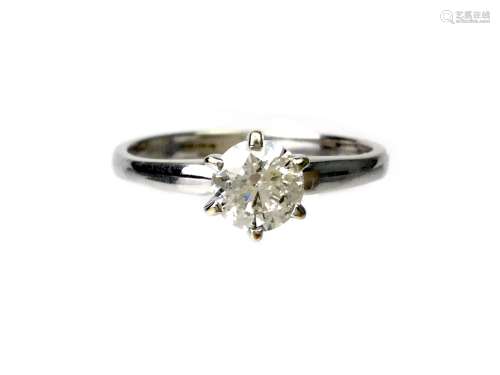 DIAMOND SOLITAIRE RING, the round brilliant cut diamond of approximately 0.65 carats, partially