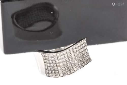 DIAMOND HALF ETERNITY RING, set with seven rows of round brilliant cut diamonds to a waved band, the