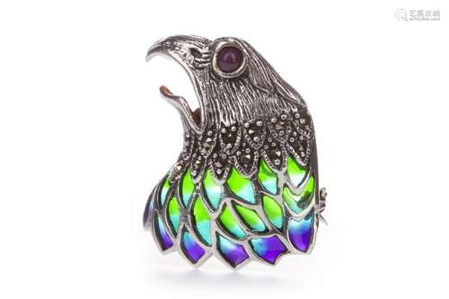 PLIQUE-A-JOUR EAGLE HEAD BROOCH, set with a cabochon ruby eye, with marcasite stones and purple,