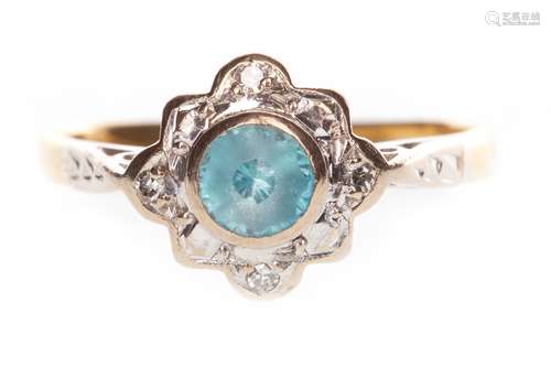 BLUE ZIRCON AND DIAMOND RING, the central blue zircon flanked by four round brilliant cut diamonds