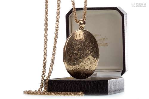 LARGE GOLD LOCKET of oval form, with engraved decoration, 53mm long excluding bale, with nine