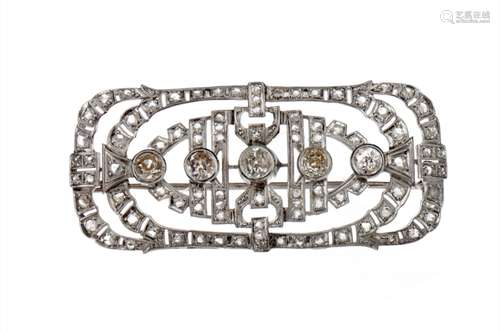 DIAMOND BROOCH, of openwork form, set with five central old cut diamonds bordered by rose cut