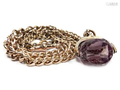 PURPLE GEM SET SWIVEL FOB, in nine carat gold, on a curb link chain, some links marked 375, with dog