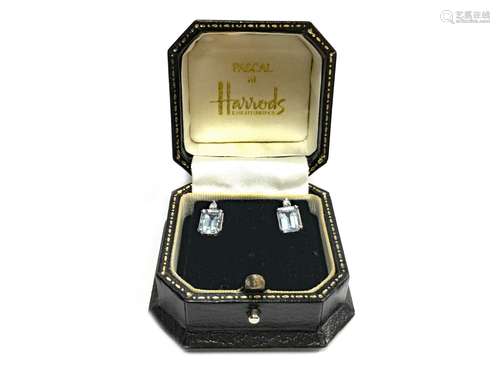 PAIR OF BLUE GEM SET AND DIAMOND EARRINGS, the step cut blue gems 8mm long, to a diamond set post,