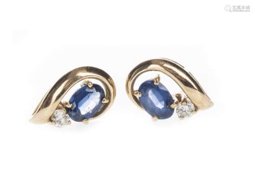 PAIR OF BLUE GEM SET AND DIAMOND EARRINGS, each set with an oval blue gem and a round brilliant