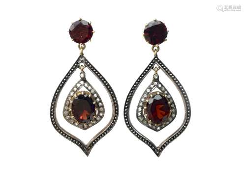 PAIR OF GOLD PLATED GARNET AND DIAMOND EARRINGS, each set with an oval garnet within a border of old