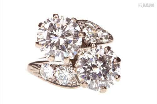 DIAMOND TWO STONE RING, set with a round brilliant cut diamond of approximately 2.12 carats and