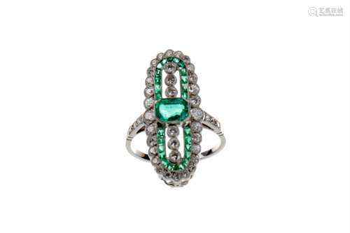 EMERALD AND DIAMOND RING, the central step cut emerald flanked by three collet set diamond, within a