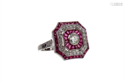 SPINEL, RUBY AND DIAMOND RING, the octagonal bezel set with round brilliant cut diamonds and calibre