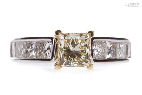 YELLOW DIAMOND RING, the yellow princess cut diamond of approximately 1.50 carats, flanked by four