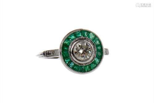 EMERALD AND DIAMOND TARGET RING, the round brilliant cut diamond of approximately 0.44 carats within