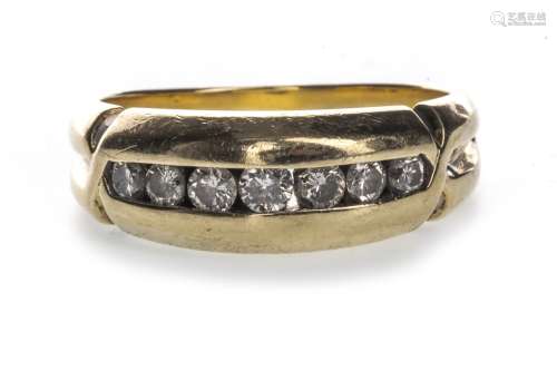 GENTLEMAN'S DIAMOND SET BAND, with a row of round brilliant cut diamonds totalling approximately 0.
