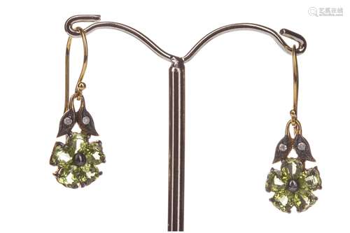 PAIR OF PERIDOT AND DIAMOND EARRINGS, the heart shaped peridots forming a flower, with round