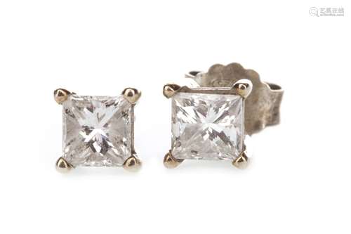 PAIR OF DIAMOND STUD EARRINGS, each set with a princess cut diamond of approximately 0.50 carats,