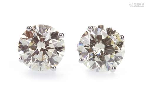 PAIR OF IMPRESSIVE DIAMOND STUD EARRINGS, the round brilliant cut diamonds totalling approximately