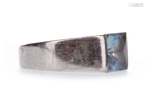 CARTIER TANK RING, set with a square blue gem 8mm wide, numbered 15500, marks worn, hand engraved