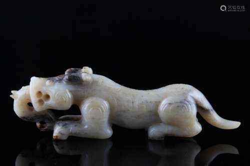 A Chinese Carved Hetian Jade Tiger Ornament
