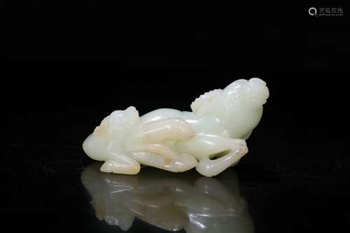 A Chinese Carved Hetian Jade Cow Ornament