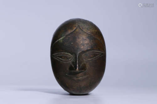 A Chinese Copper Face Shaped Compact