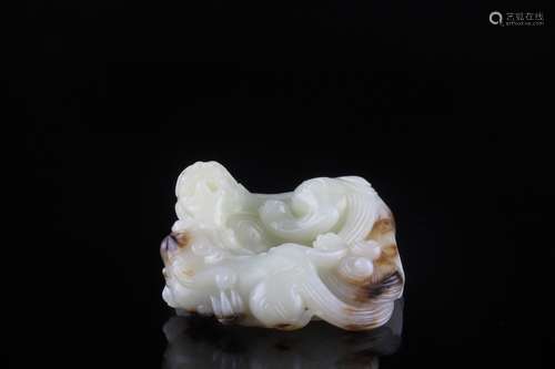 A Chinese Carved Hetian Jade Beast Ornament