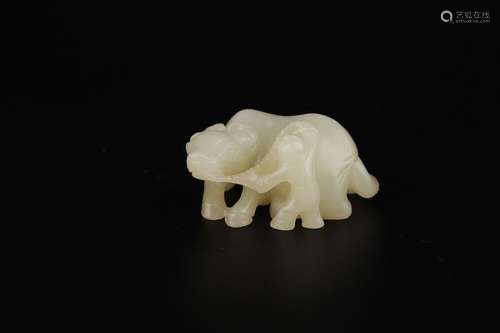 A Chinese Carved Hetian Jade Ox Ornament