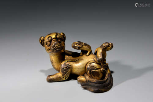 A Chinese Gild Copper Lion Ornament