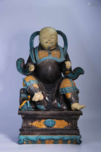 A Chinese Tang tri-colored Porcelain Emperor Zhenwu’s Statue