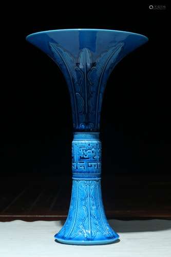 A Chinese Peacock Blue Glazed Carved Porcelain Flower Vase