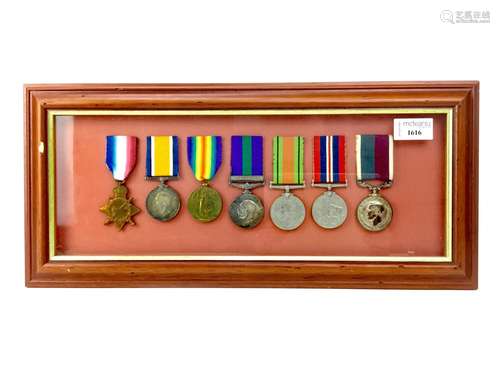 A FRAMED WORLD WAR MEDAL GROUP RELATING TO THE LOGUE FAMILY