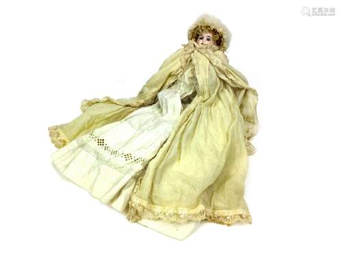 AN EARLY 20TH CENTURY GERMAN BISQUE HEADED DOLL