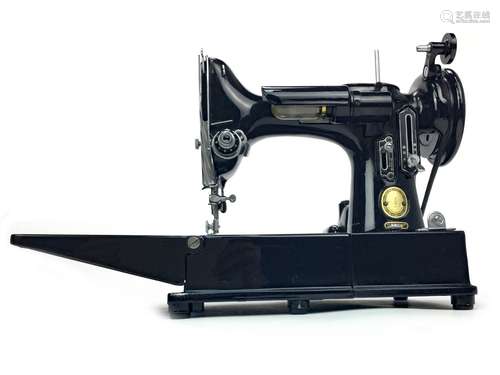 A SINGER 222K SEWING MACHINE