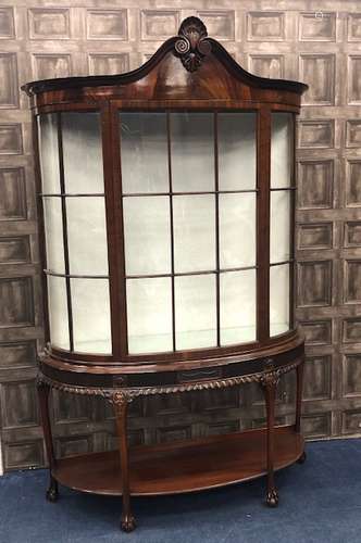 A MAHOGANY BOW FRONT DISPLAY CABINETOF CHIPPENDALE DESIGN