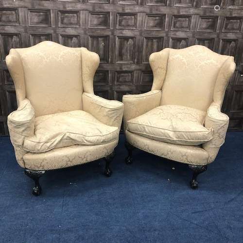 A PAIR OF MAHOGANY FRAMED WING BACK ARM CHAIRS OF QUEEN ANNE DESIGN