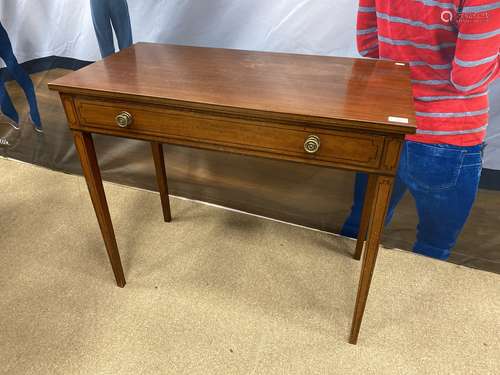 A POST REGENCY MAHOGANY OBLONG WRITING TABLE