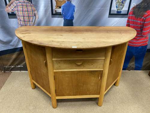 A MODERNIST DINING TABLE AND SIDEBOARD