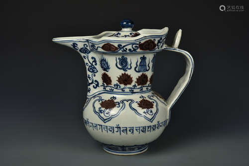 AN UNDERGLAZE BLUE AND COPPER RED TIBETAN EWER MING DYNASTY