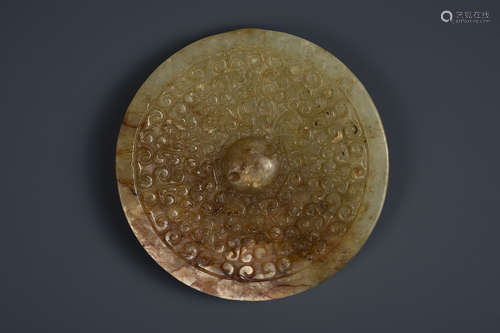 A CREAMY JADE MIRROR HAN DYNASTY