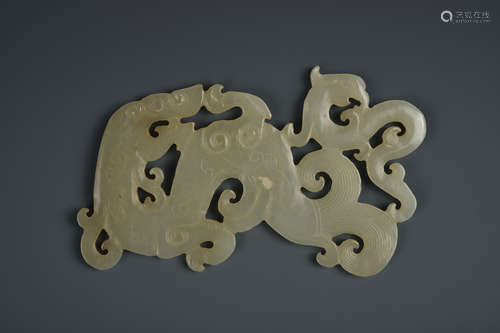 A CREAMY WHITE JADE ORNAMENT QING DYNASTY