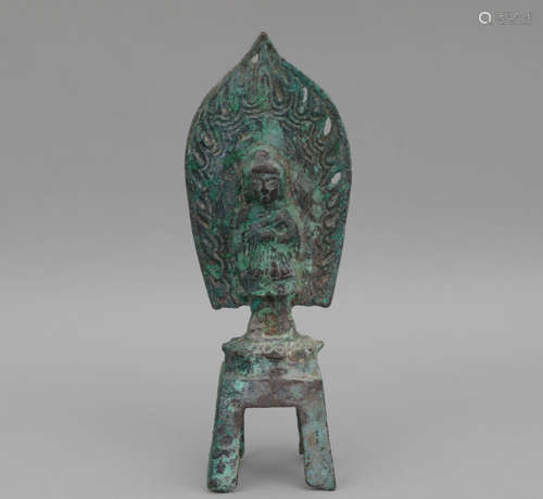 A BRONZE SHAKYAMUNI STATUE