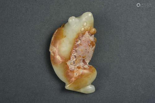 A WHITE AND RUSSET JADE FROG QING DYNASTY