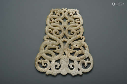 A RETICULATED JADE ORNAMENT HAN DYNASTY