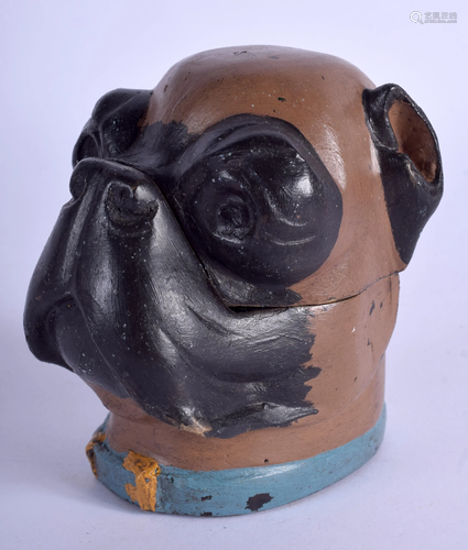 A COLD PAINTED PUG DOG INKWELL. 10 cm x 5 cm.