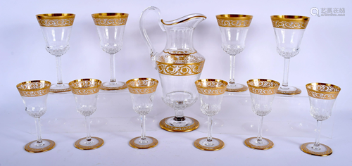 A SUITE OF ST LOUIS GILT DECORATED GLASSWARE…