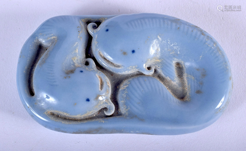 A CHINESE BLUE CELESTE PORCELAIN CATFISH…